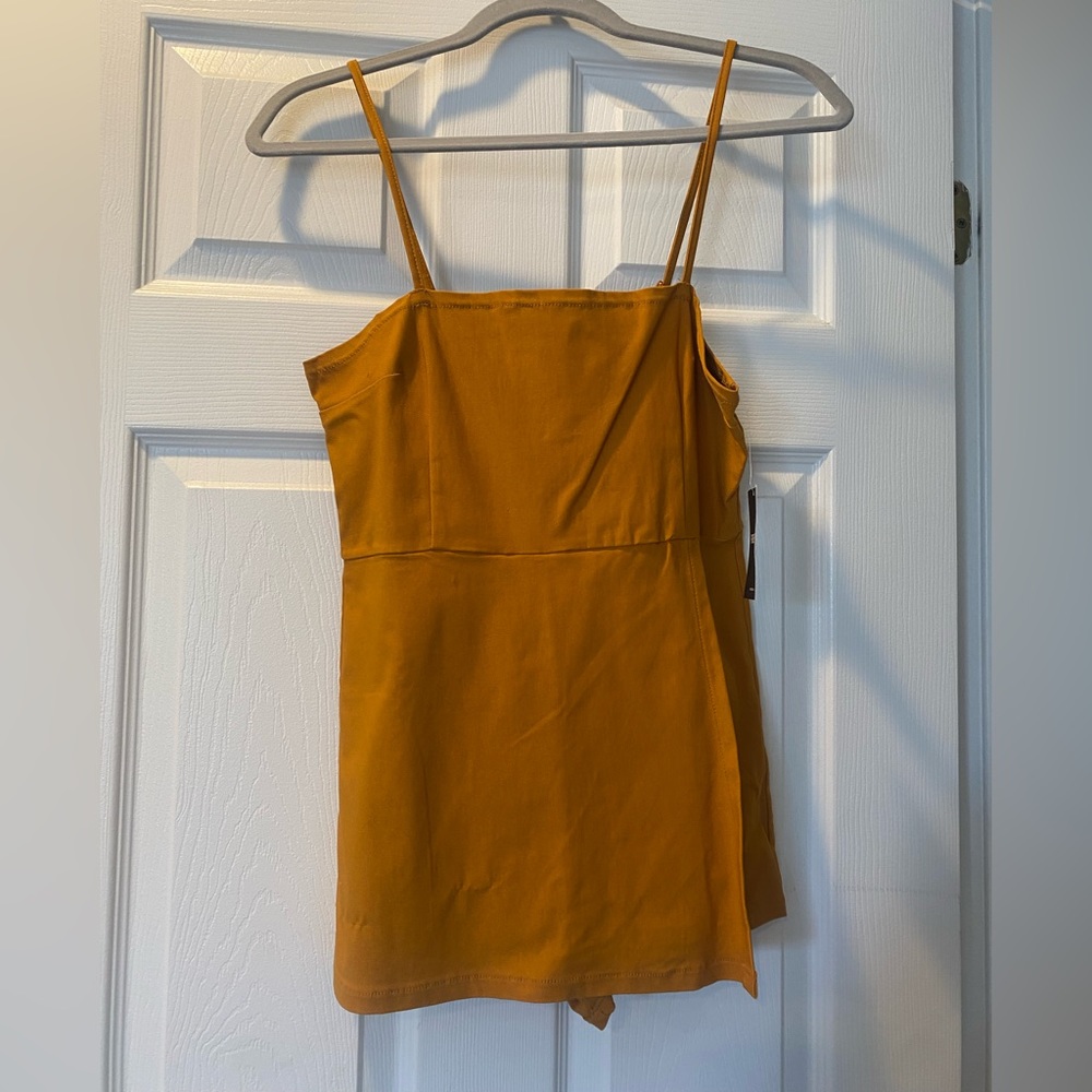 FOREVER 21. NEVER WORN. A very cute mini mustard skort dress. Size S.